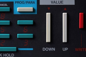 Obscurely labelled buttons on a device control pad